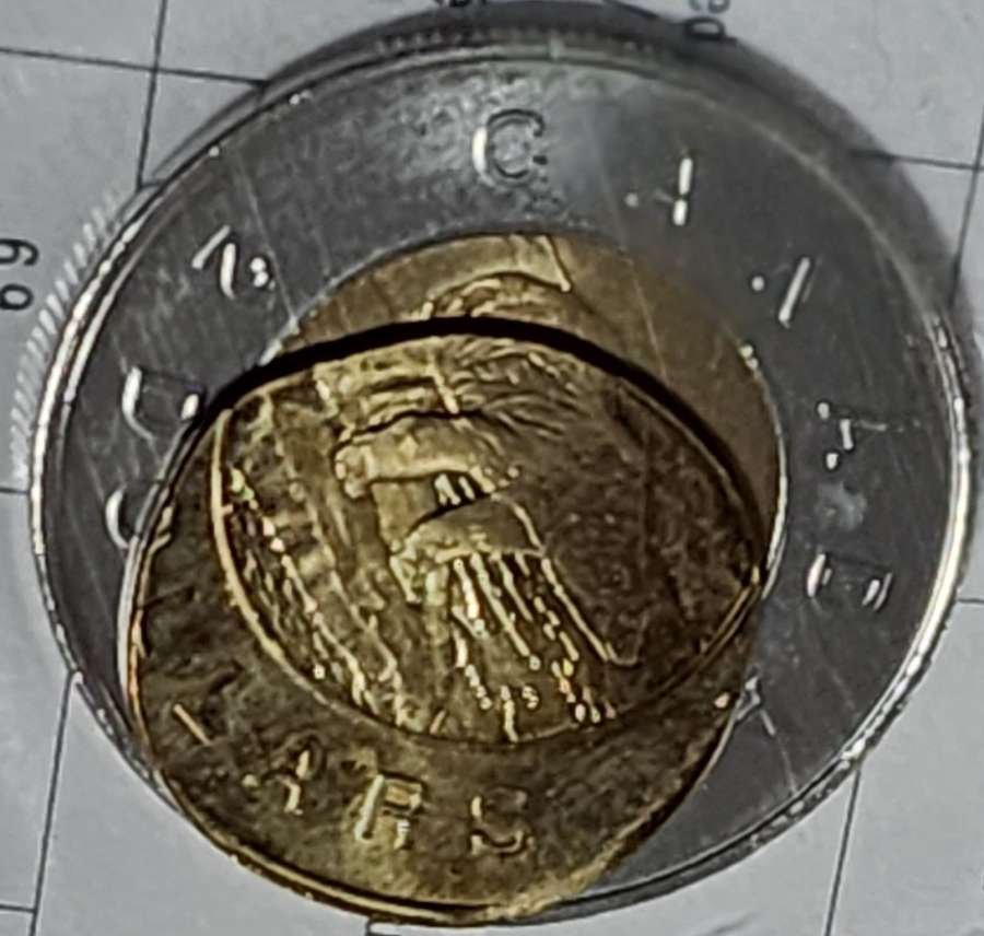PMD-Or-Actual-Error-Twoonie?